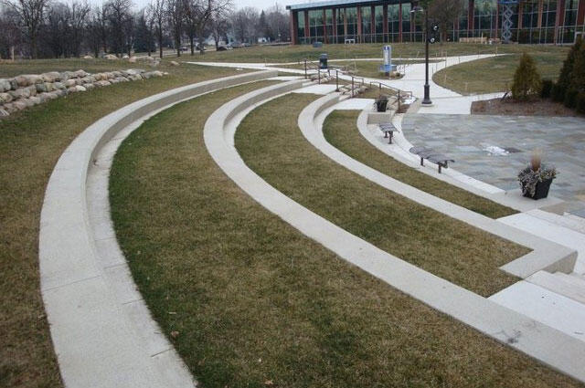 concret steps with green grass